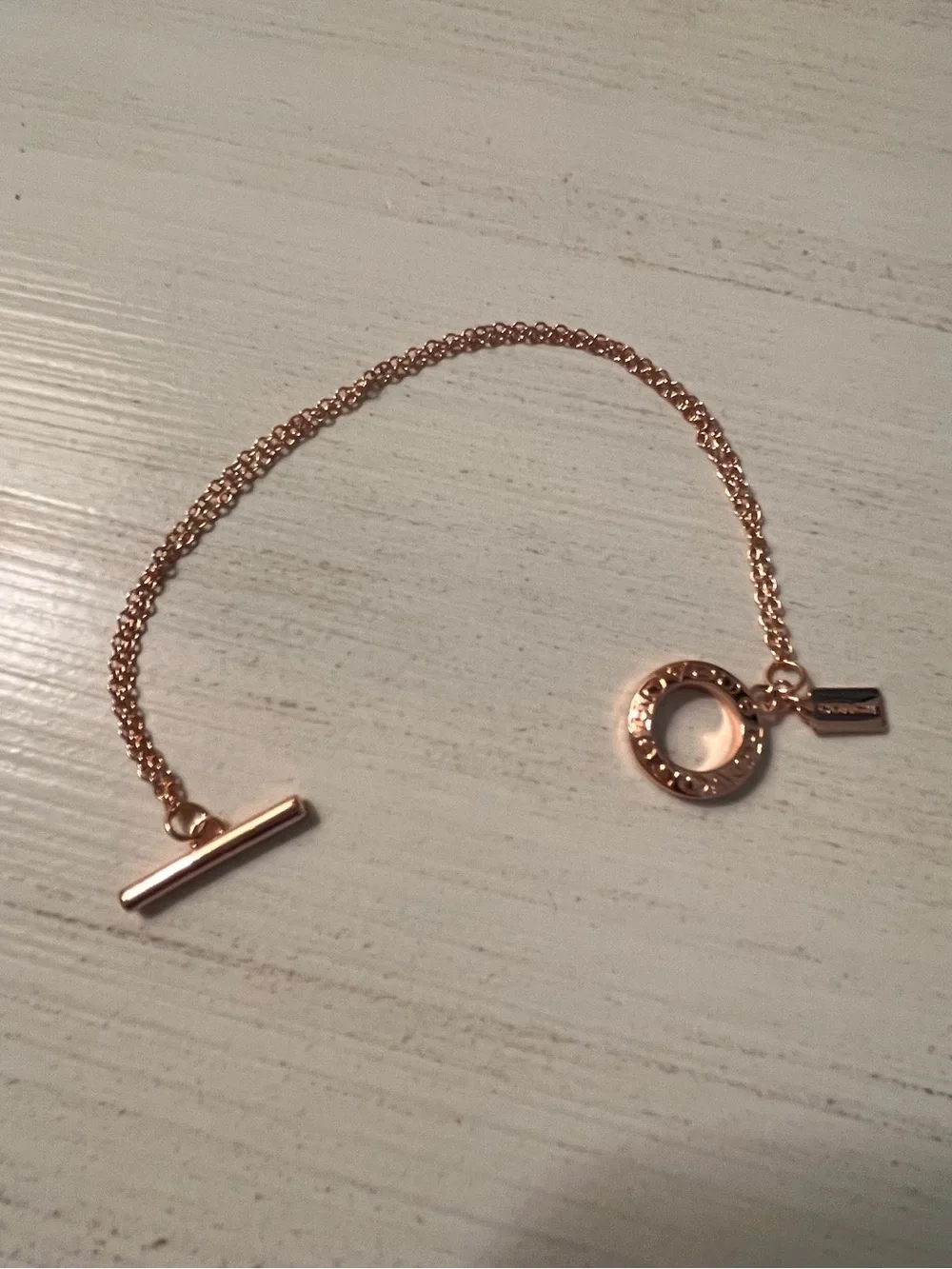 Coach rose gold